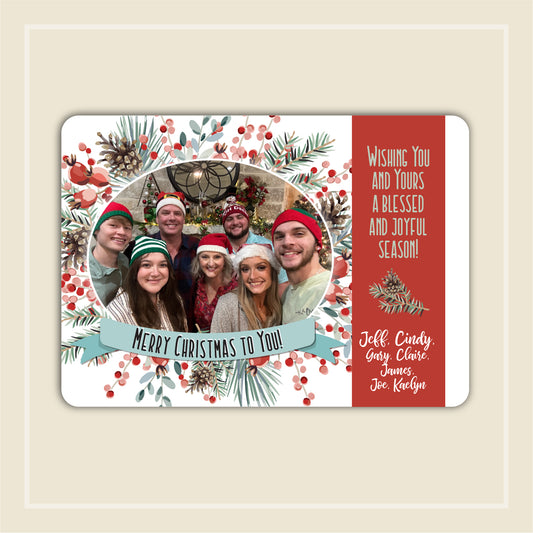 Personalized Christmas card with a photo of a group of people and festive design elements. Berries, Christmas foliage, cute, casual, christmas card, custom, on sale now!