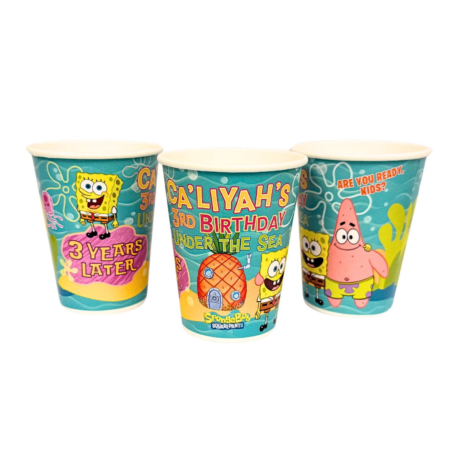 SpongeBob party Custom designed 9 oz paper party cups sold in sets of 12. Personalized cups for warm or cold drinks featuring your theme, colors, name and age. Great for Disney Princess, Cars, Moana, Bluey, Paw Patrol, Cocomelon, Frozen, Toy Story, Mickey Mouse, Minnie Mouse, Barbie, Spider-Man, Stitch, Pokémon, Super Mario, Sonic, construction, dinosaur, unicorn, jungle and other birthday party themes.